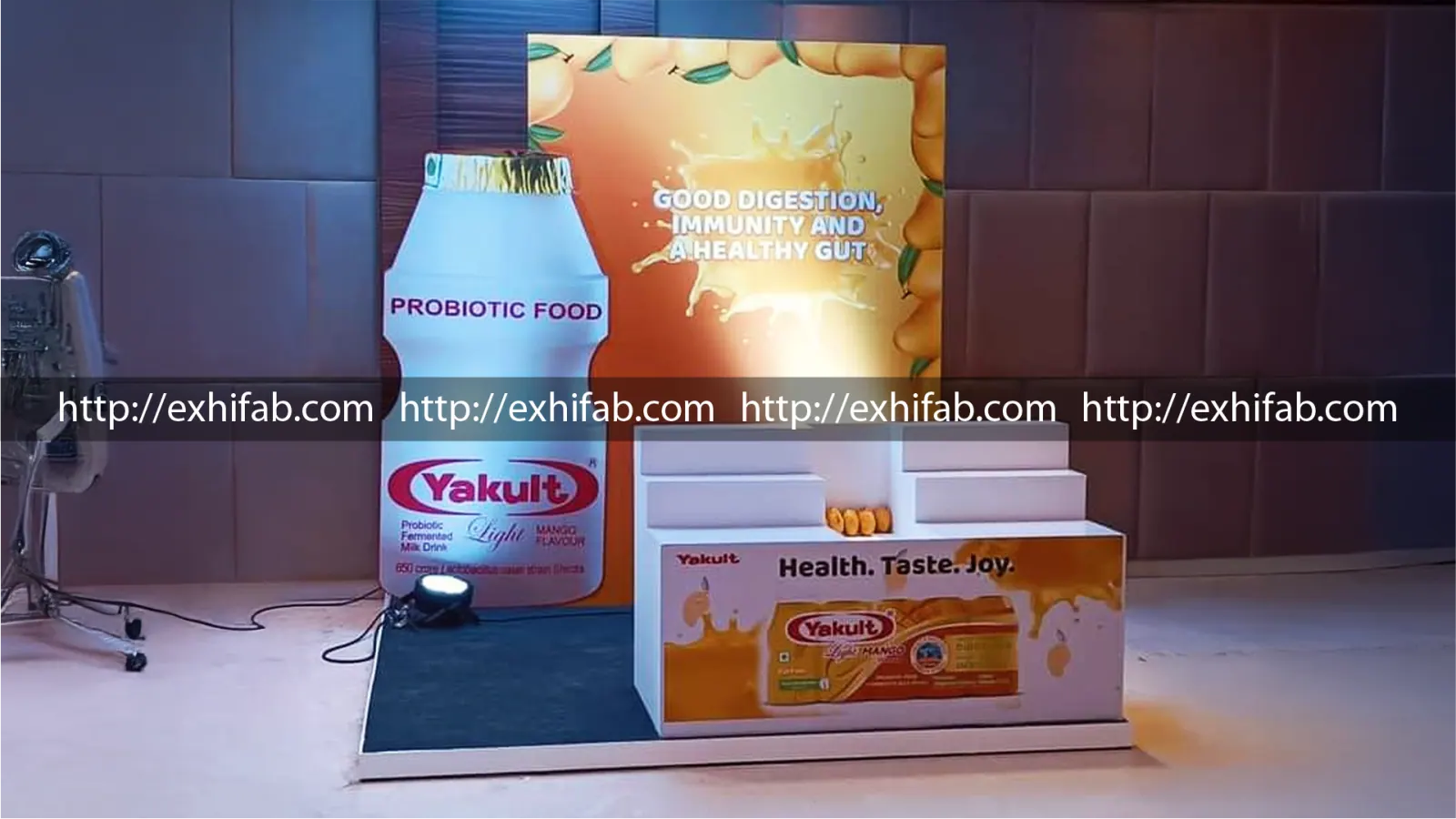 Product display stall designed for Yakult with branded sampling counters